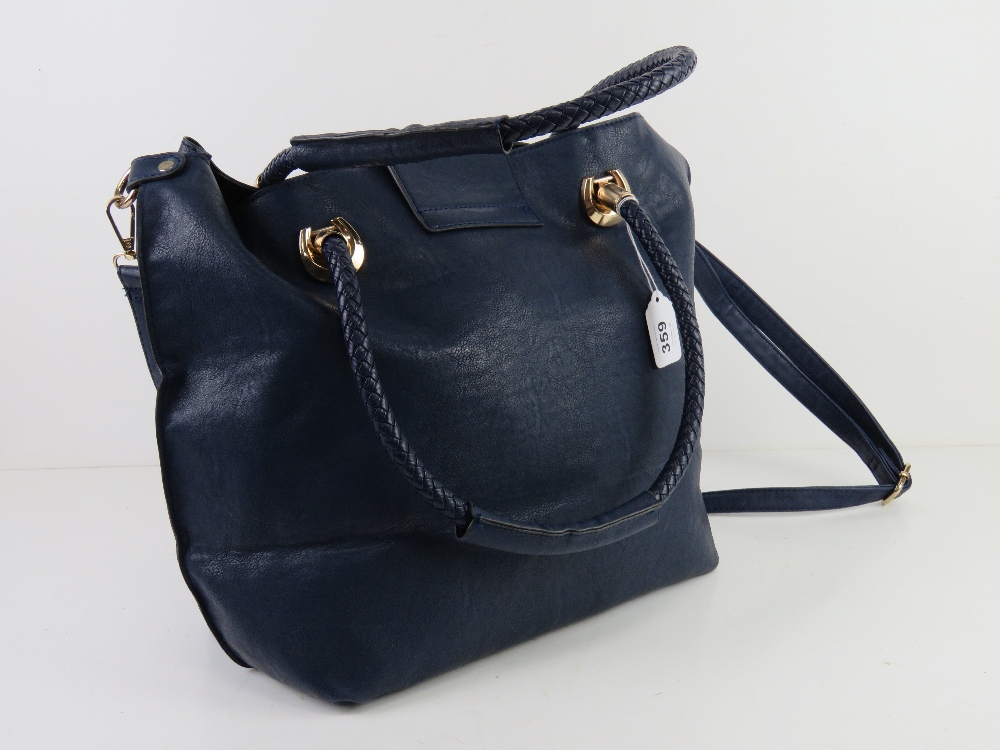 A navy blue tote bag with shoulder strap and woven handles, approx 30cm wide. - Image 2 of 4