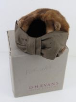 A vintage fur hat by Jeanne Pierre 22 Bowchamp Place SW3 Tel. Ken. 1721. In vintage hat box.