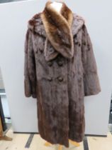 A vintage faux fur coat approx measurements; 40" chest, 39" length to back, 15.