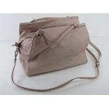 A blush pink leather handbag by Fiorelli approx 33cm wide.