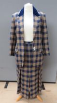 A 70% wool, 30% lambswool Barry Sherrard skirt suit in tartan type pattern with velvet collar,