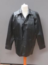 A black leather trench coat type jacket by Elements, size Extra Large,
