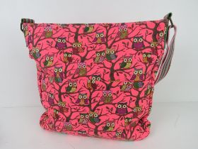 A fabric tote bag having owl pattern in orangy pink 'as new', approx 38 x 34cm.
