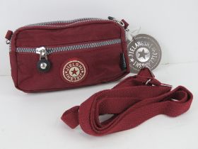 A fabric clutch bag/handbag 'as new' 18 x 11cm in red.