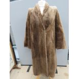 A vintage fur coat, approx measurements; 40" chest, 46" length to back, 18" underarm sleeve.