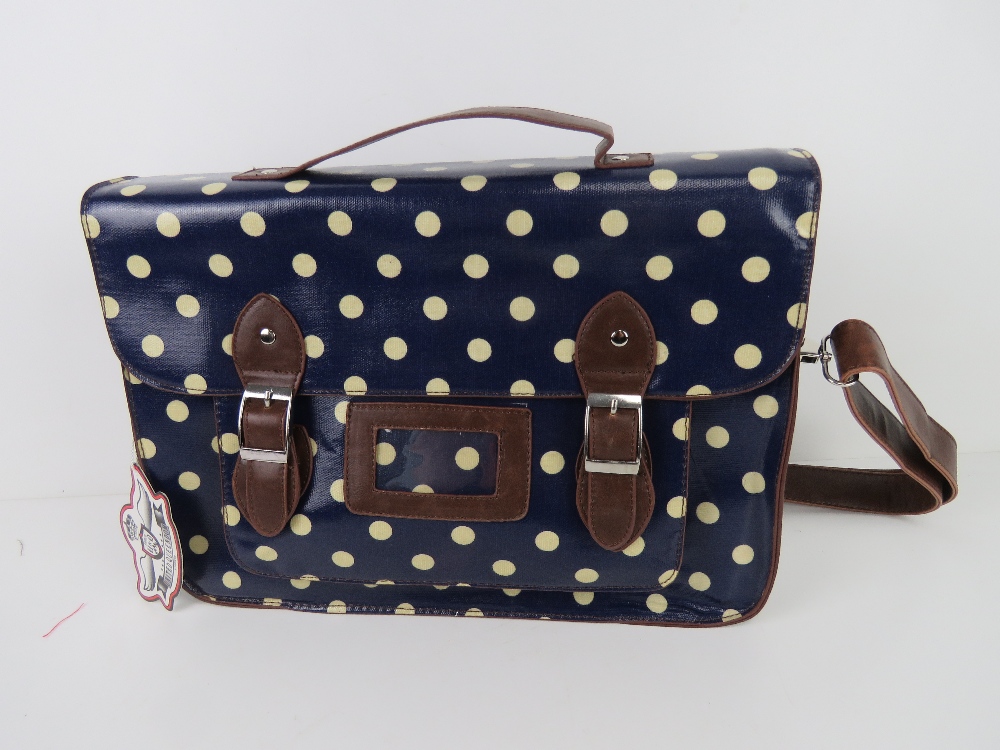 A blue polka dot satchel type handbag 'as new', approx 38 x 27cm.