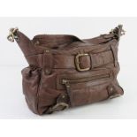 A brown leather handbag by River Island approx 27cm wide.