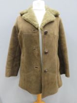 A vintage sheepskin coat, chest size 41, approx measurements; 33" length to back,
