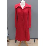 A 22% wool red coat size 14, approx measurements; 38" chest, 44" length to back,