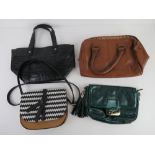 A quantity of handbags inc Next, green clutch bag and cross body bag. Four items.