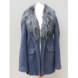 A ladies jacket in navy and black with faux fur collar, 10% wool, size 14.