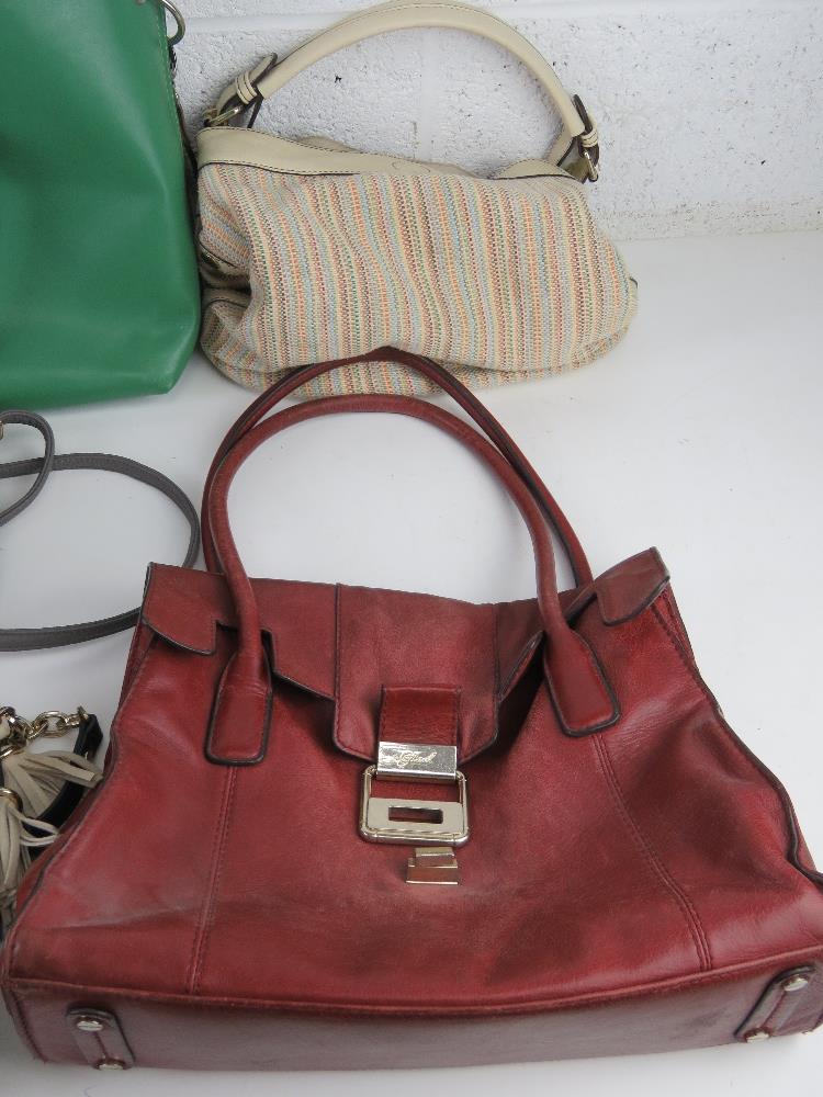 A quantity of assorted handbags inc red polka dot, green tote, vintage leather, fabric tote, - Image 6 of 7