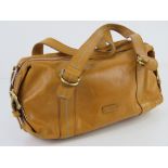 A leather handbag by Tula in mustard yellow, approx 28cm wide.
