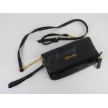 A Kenneth Cole fold over clutch type handbag approx 22.5cm wide.