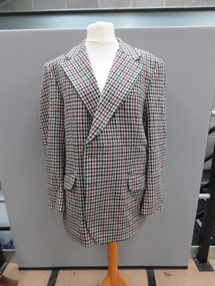 A men's jacket by Burton in black/red/green check, woollen fabric, approx measurements; 46" chest,