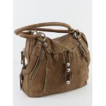 A brown leather handbag by Dorella having suede lining, some pen marks noted to lining,