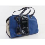 A blue and grey leather handbag by Clarks approx 31cm wide.