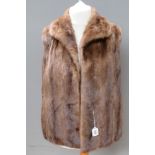 A vintage fur gillet, no apparent labels, approx measurements 37" chest, 27" length to back.