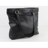 A black leather tote bag by Dickins & Jones approx 32cm wide.