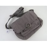 A grey handbag by Kipling, key chain deficient, approx 30cm wide.