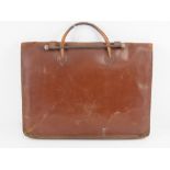 A vintage leather ladies briefcase having single handle and measuring 40cm wide.