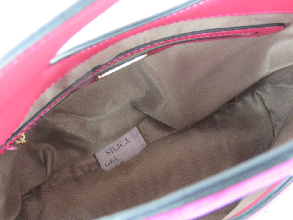 A fushia velvet handbag by Bessie London, having original tags upon, no shoulder strap. - Image 4 of 4
