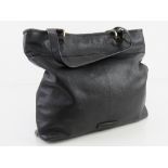 A black leather tote bag by Dickins & Jones approx 32cm wide.