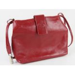 A red Italian leather handbag by Simona Ferri, approx 26cm wide.
