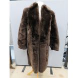 A vintage faux fur coat, approx measurements; 42" chest, 42" length to back, 17" underarm sleeve.