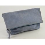 A blue suede fold over handbag having shoulder strap within by Top Shop approx 35cm wide.