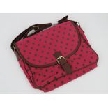 A red polka dot fabric handbag 'as new' 27 x 24cm.