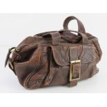 A brown leather handbag by Smith & Conova approx 30cm wide.