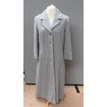 A 65% wool, 15% cashmere grey coat by Menuetto Berghaus, size 14, approx measurements; 42" chest,
