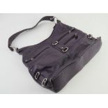 A purple leather handbag by Smith Conova, wear noted to corners, approx 37cm wide.