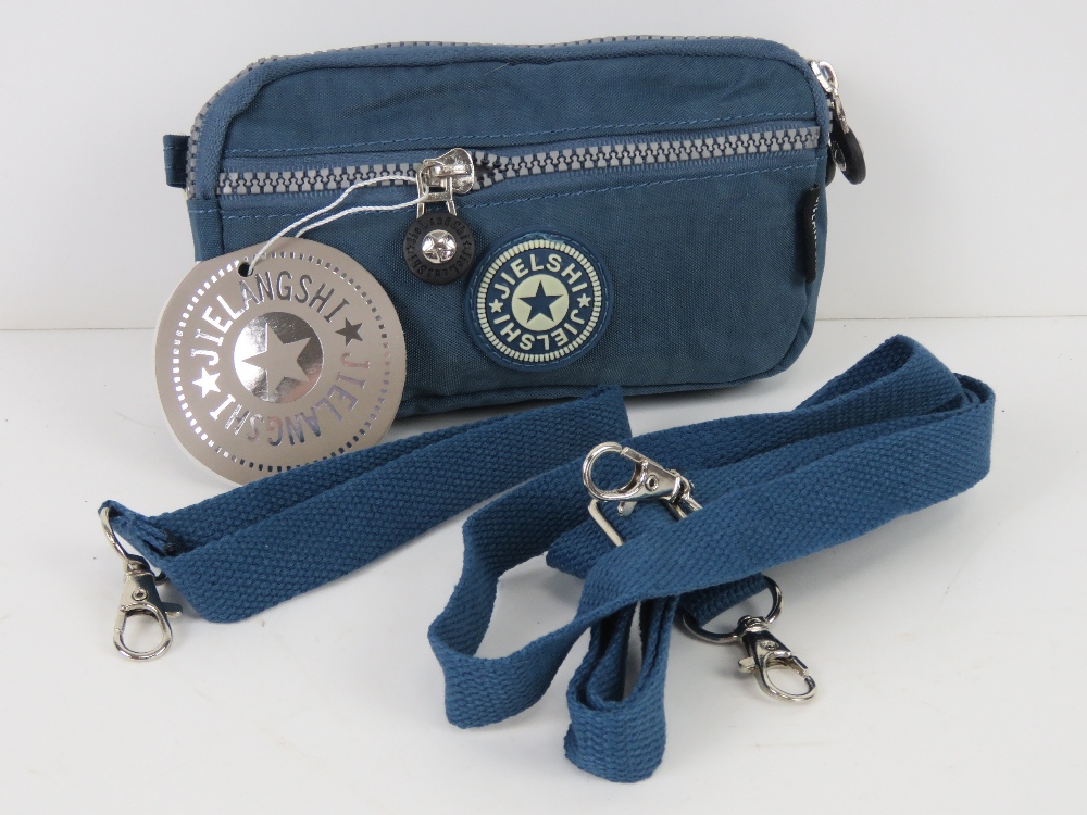 A fabric clutch bag/handbag 'as new' 18 x 11cm in blue.