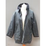 A 100% cotton waxed jacket by Country Collection for M&S, size Medium to fit 36-38" chest,