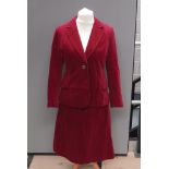 Vintage 1970's red velvet skirt suit by Maurice Henri. Wide notched lapels and twin waist pockets.