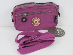 A fabric clutch bag/handbag 'as new' 18 x 11cm in fuchsia.