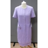 A lilac skirt suit by Barry Sherrard, size 12, comprising skirt and belted jacket.