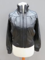 A black leather bomber jacket size 10, approx measurements; 36" chest, 23.