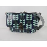 A leaf patterned handbag in blue 'as new', approx 31 x 20cm.