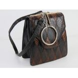 A vintage snakeskin leather handbag 19cm wide.