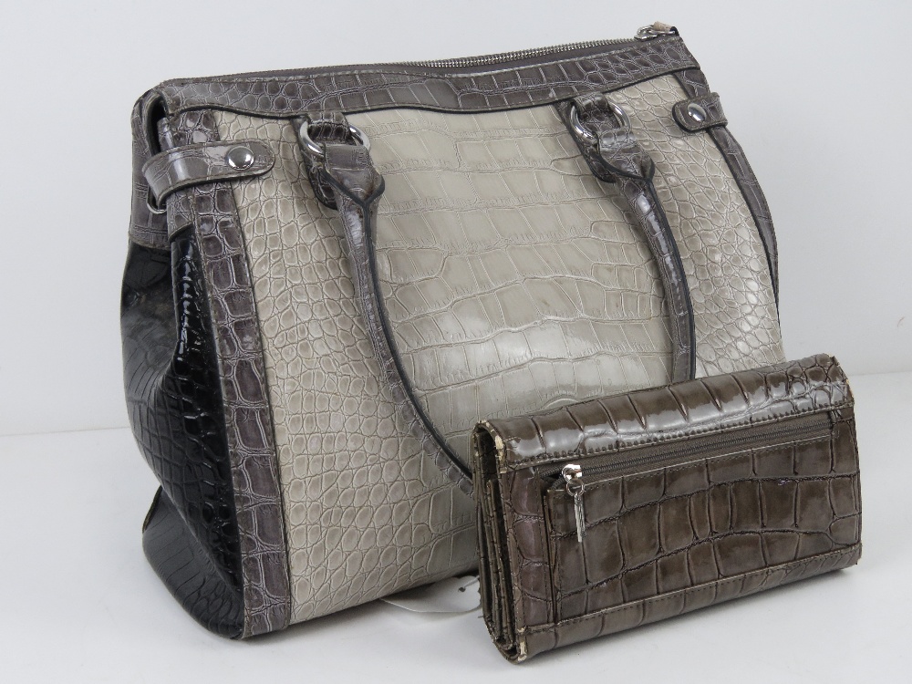 A Guess handbag with coordinating purse in grey, white and black. 35 x 27cm. - Image 7 of 8