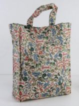 Harrods; a cotton coated with PVC shopping tote approx 28cm wide.