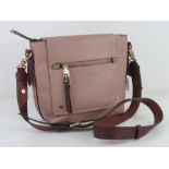 A blush pink and burgundy Jasper Conran handbag approx 29cm wide.