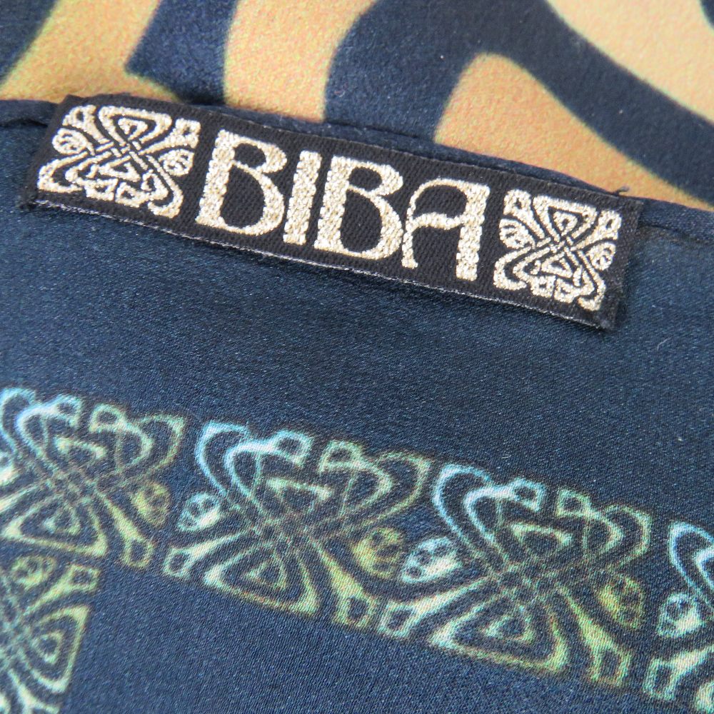 A vintage Biba scarf together with a Moschino 100% silk scarf and another 100% silk scarf bearing - Image 2 of 2