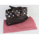 A brown polka dot Radley handbag complete with original dust bag, approx 30cm wide.