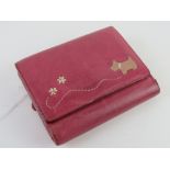 A pink leather Radley purse/wallet, approx 12cm wide.