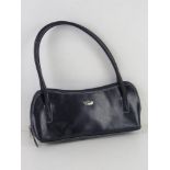 An Italian leather handbag in navy blue approx 33cm wide.