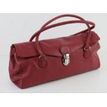 Tommy & Kate; a red leather handbag approx 39cm wide.